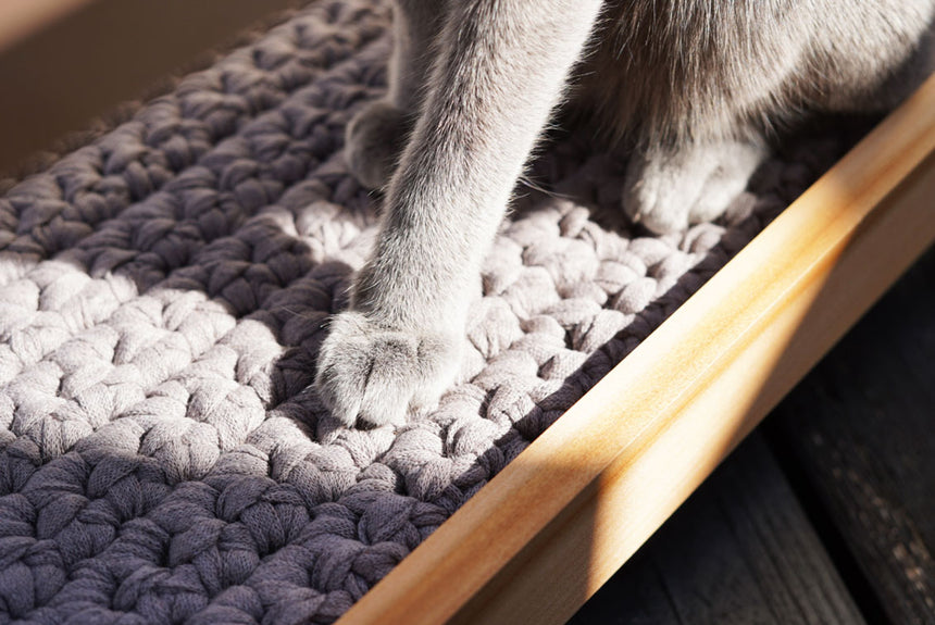 Hand-knitted mat